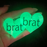 brat - Glow in the Dark Heart Shaped Acrylic Statement Earrings