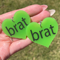 brat - Green and Black Heart Shaped Acrylic Statement Earrings